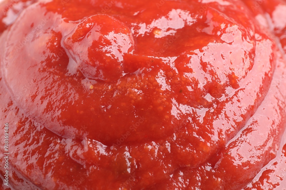 Tasty ketchup as background, closeup. Tomato sauce Tasty ketchup as background, closeup. Tomato sauce