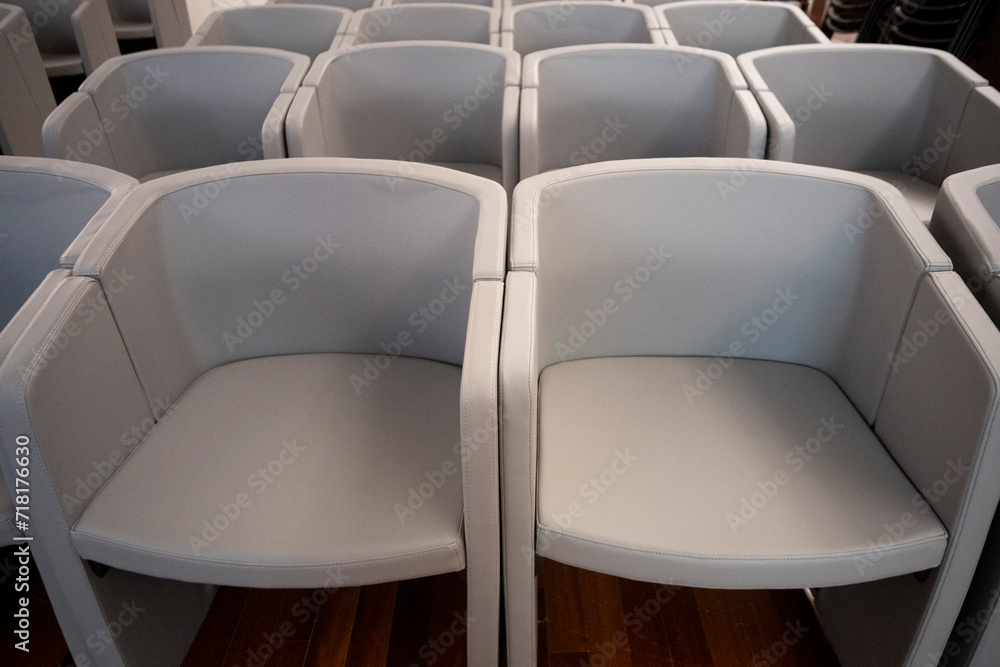 Obraz premium gray office armchairs arranged in a row
