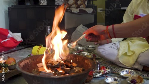 Cinematic footage of Havan or Yagya , a Hindu ritual of offering substances to a holy fire while chanting mantras.Uttarakhand India photo