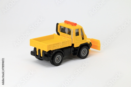 Snowplow, yellow road service truck, die cast car, toy car, white background