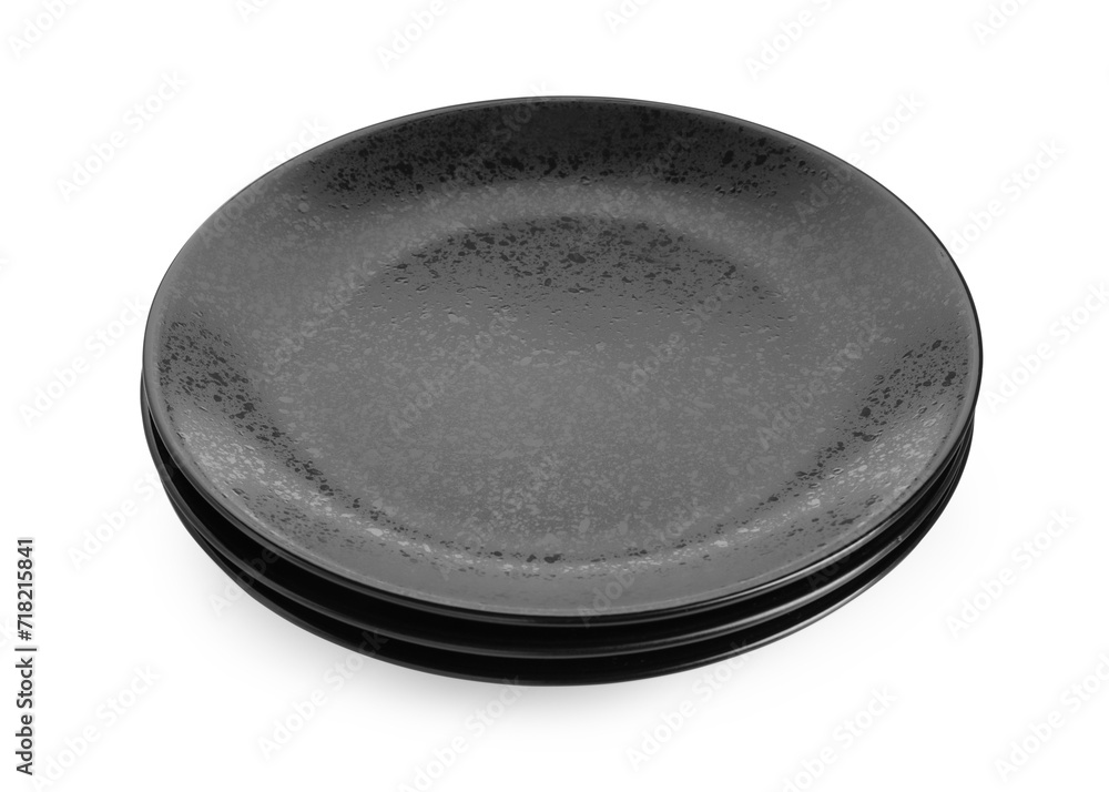 Three black ceramic plates isolated on white Three black ceramic plates isolated on white
