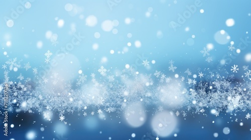 Falling snowflakes and Bokeh with white snow on a blue background