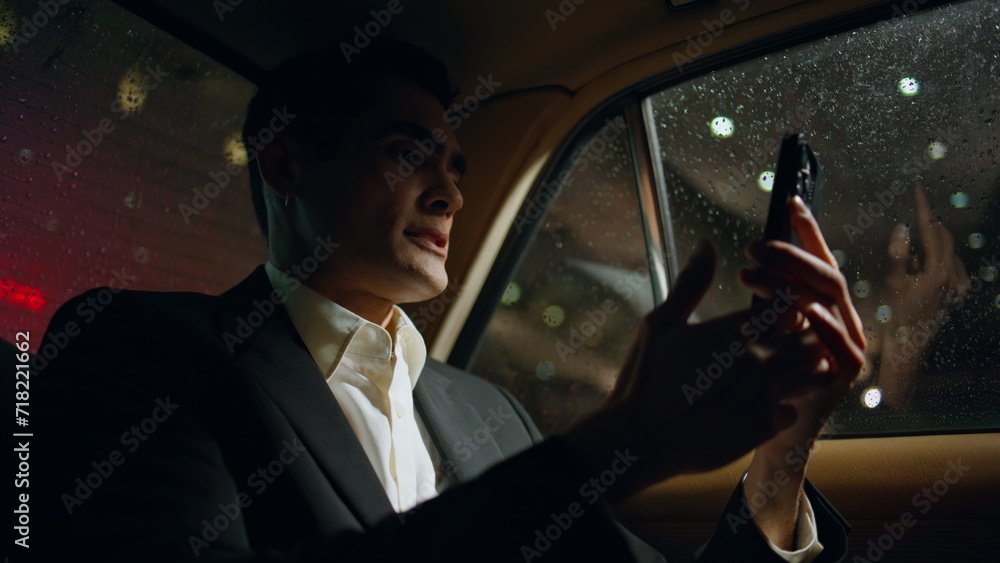 Rich director videocalling smartphone in business car closeup. Man making call Rich director videocalling smartphone in business car closeup. Man making call