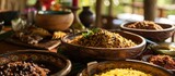 A sumptuous spread of rice with dark pigeon peas is beautifully presented on the table, enticing the diners with its rich colors and fragrant aroma.