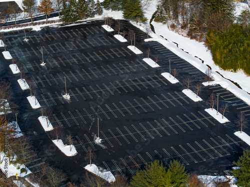 Vacant winter parking lot from an aerial view