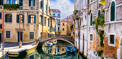 romantic Venetian streets and canals. Bridges of Venice, Italy.