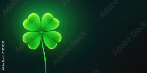 Neon shamrock leaf banner on Saint Patrick day with copy space on dark green background.