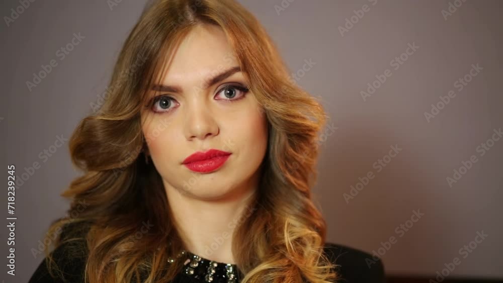 A beautiful young woman with big eyes and red lips A beautiful young woman with big eyes and red lips