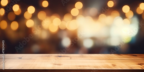 Wooden table with blurry coffee shop background and bokeh light for product display.