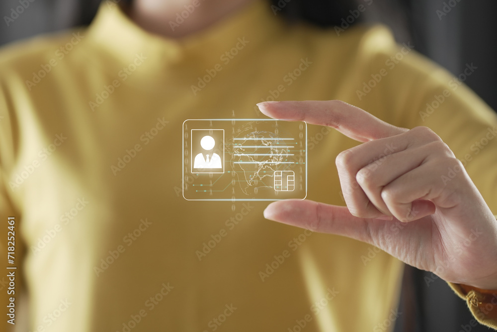 custom made wallpaper toronto digitalhuman hand holding digital identification card, technology and innovation concept. hand and digital identification card or digital ID..