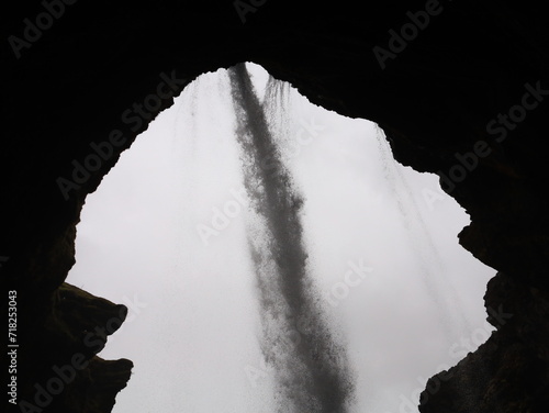 Kvernufoss waterfall is a beautiful 30-meters high waterfall that is half-hidden away in a gorge in South Iceland photo