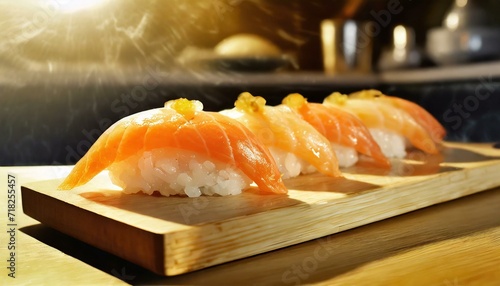 High quality authentic sushi prepared on bamboo wooden cutting board in a sushi bar