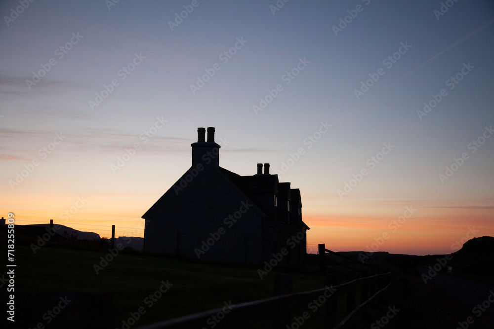 Scottish little house at sunset