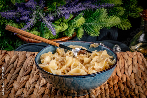 Pasta with sauerkraut and bacon. photo