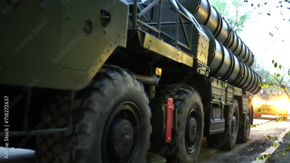 Machines C-300 - anti-aircraft missile systems ride on streets of Samara at dusk Machines C-300 - anti-aircraft missile systems ride on streets of Samara at dusk