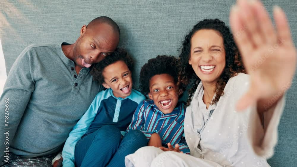 Parents, selfie and children on bed, funny face and laughing together for joke, memory and happy in home. African dad, mom and kids with photography, live streaming and comic video on social media Parents, selfie and children on bed, funny face and laughing together for joke, memory and happy in home. African dad, mom and kids with photography, live streaming and comic video on social media