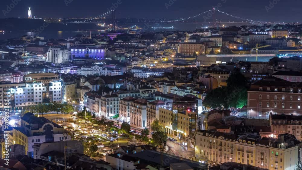 Lisbon after sunset aerial panoramic view of city centre with red roofs at autumn day to night transition timelapse, Portugal. Top view from Miradouro da Nossa Senhora do Monte viewpoint Lisbon after sunset aerial panoramic view of city centre with red roofs at autumn day to night transition timelapse, Portugal. Top view from Miradouro da Nossa Senhora do Monte viewpoint