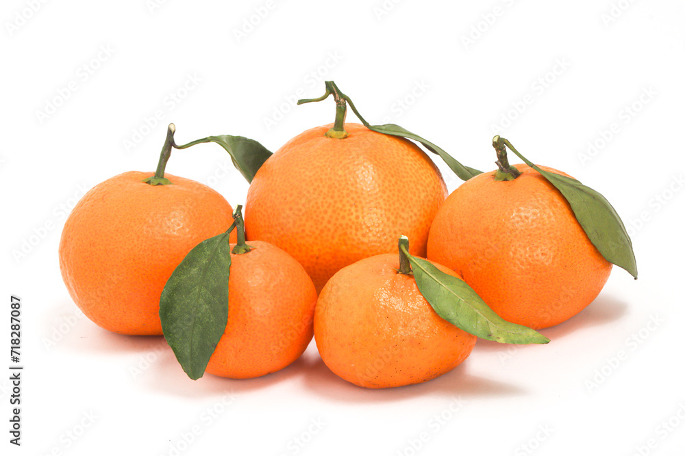 Group of fresh organic orange delicious fruit side view with green leaves isolated on white background clipping path Group of fresh organic orange delicious fruit side view with green leaves isolated on white background clipping path