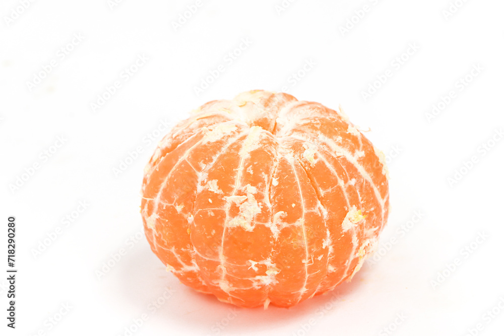Peeled fresh organic orange delicious fruit side view isolated on white background clipping path Peeled fresh organic orange delicious fruit side view isolated on white background clipping path