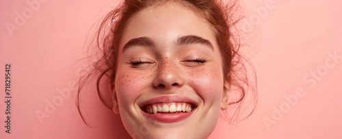  a young girl with freckled hair and a smile on her face, with her eyes closed and her eyes closed, with her eyes closed and her eyes closed.