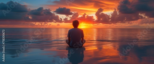 Fényképezés man practicing yoga on a lake at the sunset, calmness and emotional healing