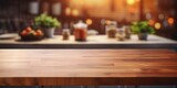 Vintage filter enhances wood table top and blurred kitchen interior background, ideal for product display or montage.