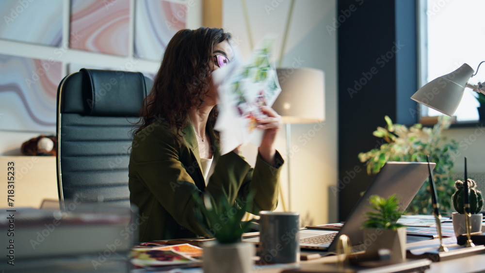 Business woman arguing video call at office desk close up. Boss throwing papers Business woman arguing video call at office desk close up. Boss throwing papers