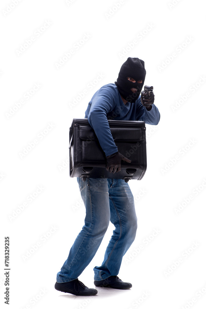 Young male burglar holding bag isolated on white Young male burglar holding bag isolated on white