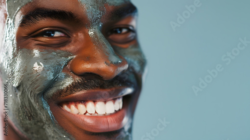 portrait of a afro american male model with care foam on the face