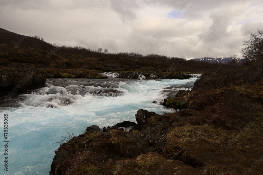 Brúará is a spring-fed river in West Iceland which runs by the boundaries of municipalities Biskupstungur and Grímsnes