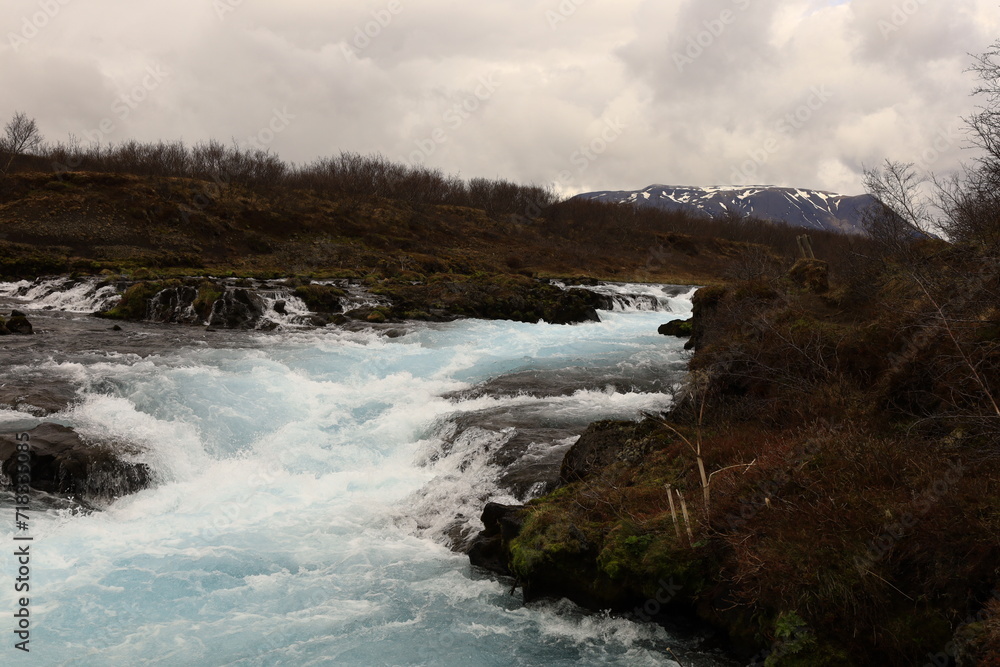 Brúará is a spring-fed river in West Iceland which runs by the boundaries of municipalities Biskupstungur and Grímsnes