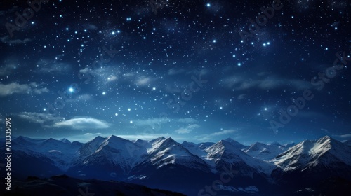  the night sky is full of stars and the mountains are silhouetted against the backdrop of snow - capped mountains. © Anna