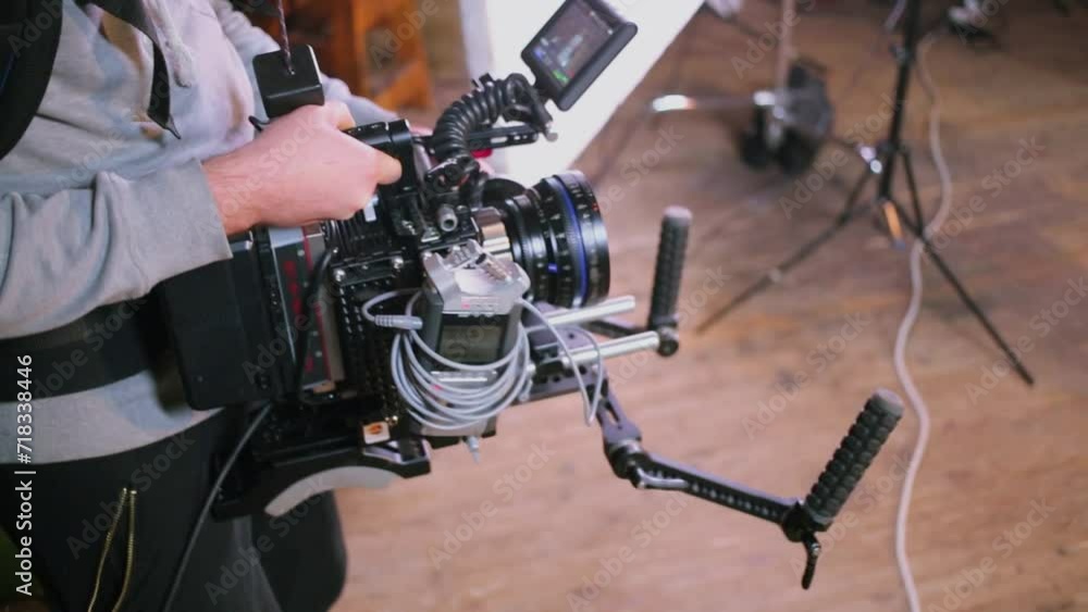 Operator work with professional camera equipment in studio Operator work with professional camera equipment in studio