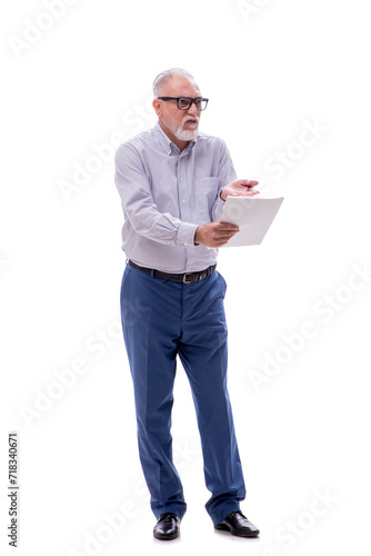 Old businessman reading paper isolated on white