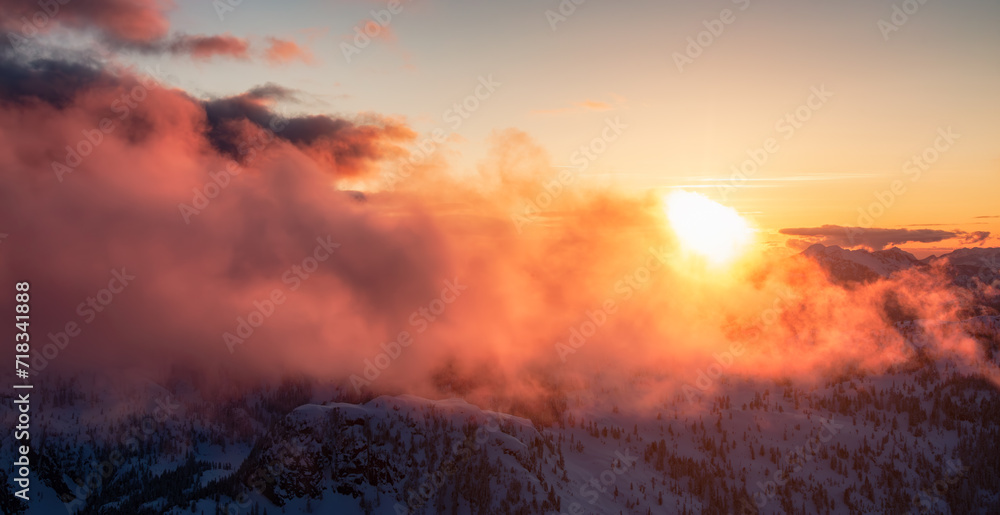 Fototapeta premium Canadian Mountain Landscape. Dramatic Sunset. Aerial Panorama Nature Background