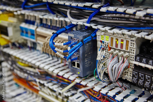 Industrial Ethernet Switch and Wiring Close-Up in Server Room photo