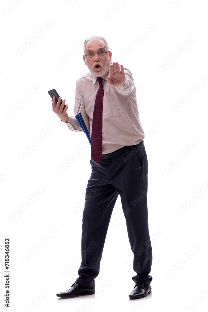 Old businessman talking by phone isolated on white Old businessman talking by phone isolated on white