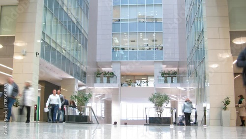 People walk in the lobby of business center Preo-8 (Preobrazhensky)