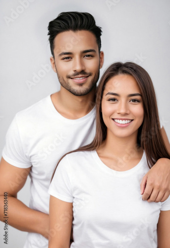 Young couple wearing white mock up t-shirts