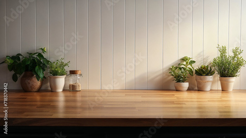Minimalistic wooden table with green houseplants and empty jars for clean product display