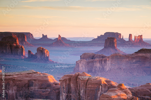 Sunrise over the rock formations at Hunt's Mesa, Monument Valley, Arizona, United States photo