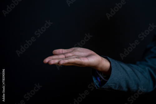 Businessman  s hand  fingers  conveying a powerful symbol of touch and connection in a conceptual image  future  big data  growth  Sustainability.