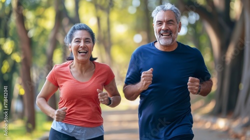 a beautiful older hispanic woman and man with short stylish hair, jogging in a park, copy space 