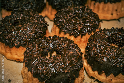 Chocolate-flavored steamed brownis donuts topped with chocolate meses photo