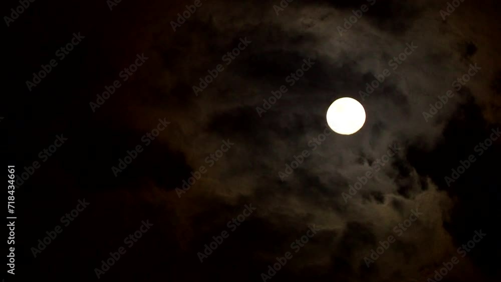 Full moon with dark cloud in the night, countryside Chiangmai province Thailand Full moon with dark cloud in the night, countryside Chiangmai province Thailand