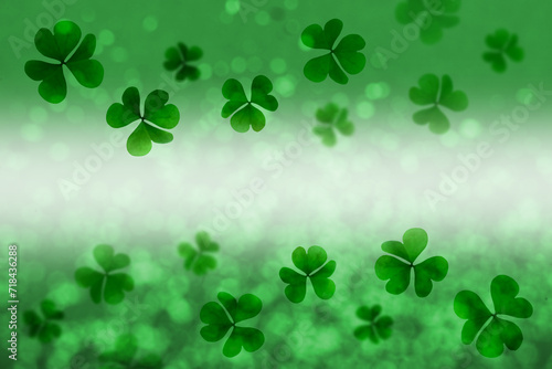 St. Patrick's Day greeting card design with clover leaves, bokeh effect