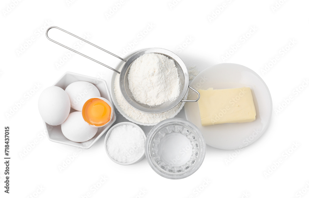 Eggs, butter, flour, salt and water isolated on white, top view. Ingredients for puff pastry dough Eggs, butter, flour, salt and water isolated on white, top view. Ingredients for puff pastry dough