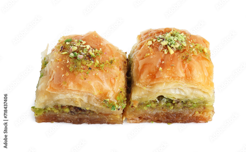 Delicious fresh baklava with chopped nuts isolated on white. Eastern sweets