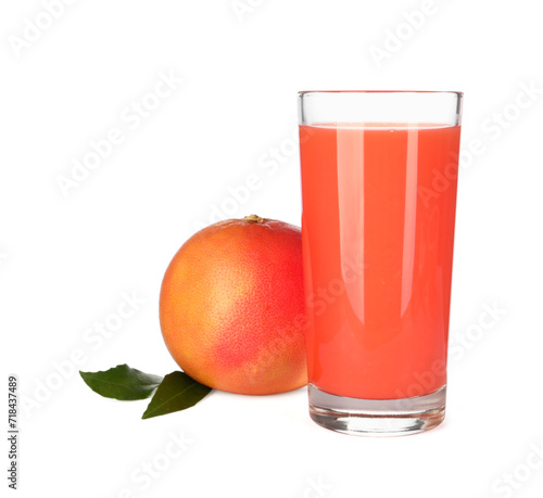 Tasty grapefruit juice in glass, leaves and fresh fruit isolated on white