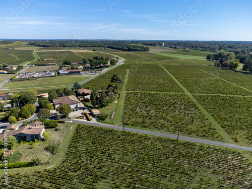 Aerial view on Sauternes village and vineyards, making of sweet dessert Sauternes wines from Semillon grapes affected by Botrytis cinerea noble rot in Bordeaux, France photo